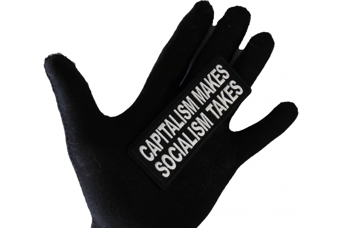 Capitalism Makes Socialism Takes Patch shown on hand for size comparison
