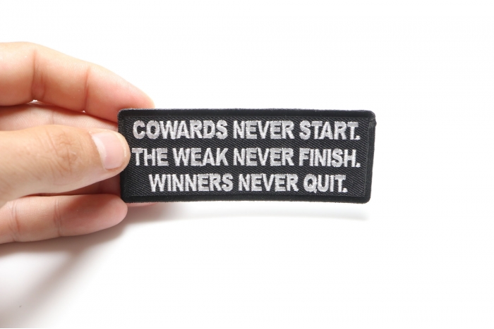 Cowards Never Start. TheWeak Never Finish. Winners Never Quit. Iron on Morale Patch shown on hand for size comparison