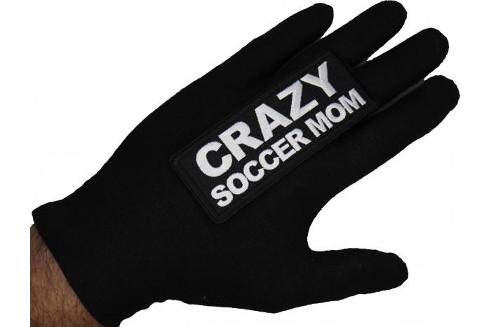 Crazy Soccer Mom Patch shown on hand for size comparison