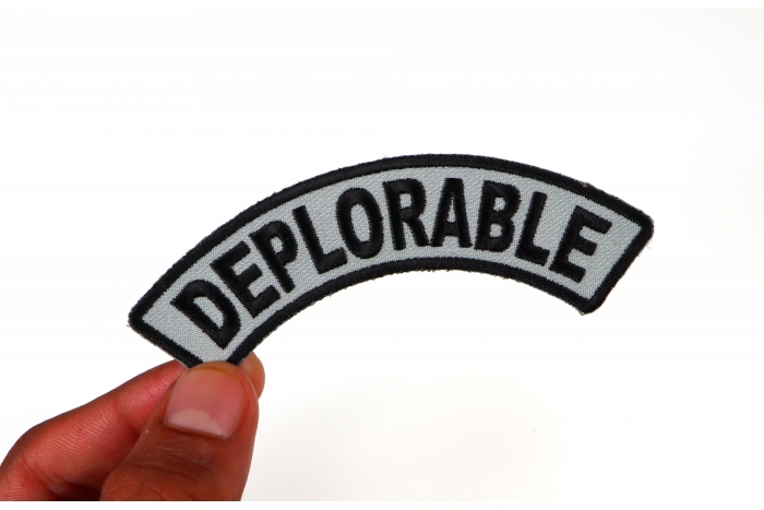 Deplorable Rocker Patch shown on hand for size comparison