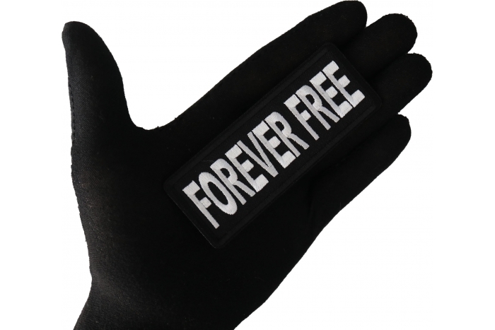 Forever Free Patch shown on hand for size comparison