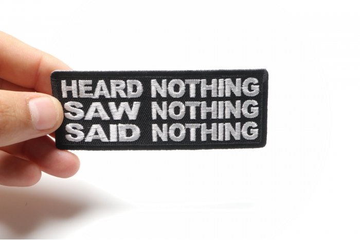 Heard Nothing Saw Nothing Said Nothing Iron on Morale Patch shown on hand for size comparison