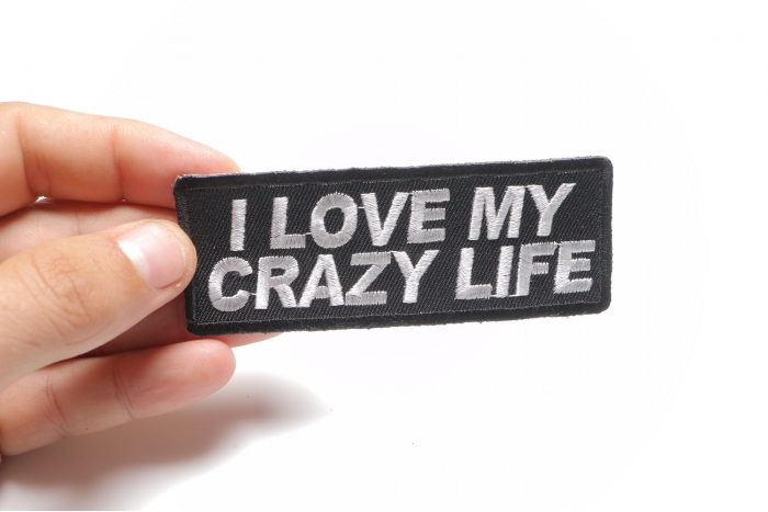 I Love My Crazy Life Iron on Morale Patch shown on hand for size comparison
