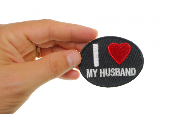 I Love My Husband Iron on Morale Patch shown on hand for size comparison