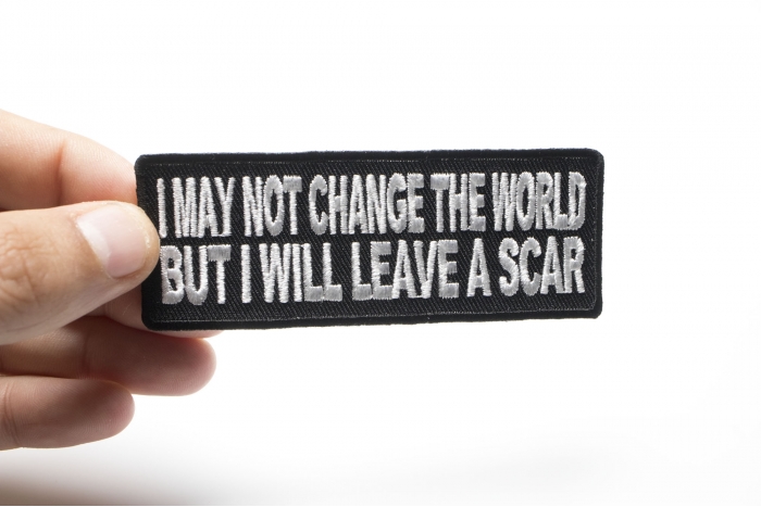 I May Not Change The World But Will Leave A Scar Iron on Morale Patch shown on hand for size comparison