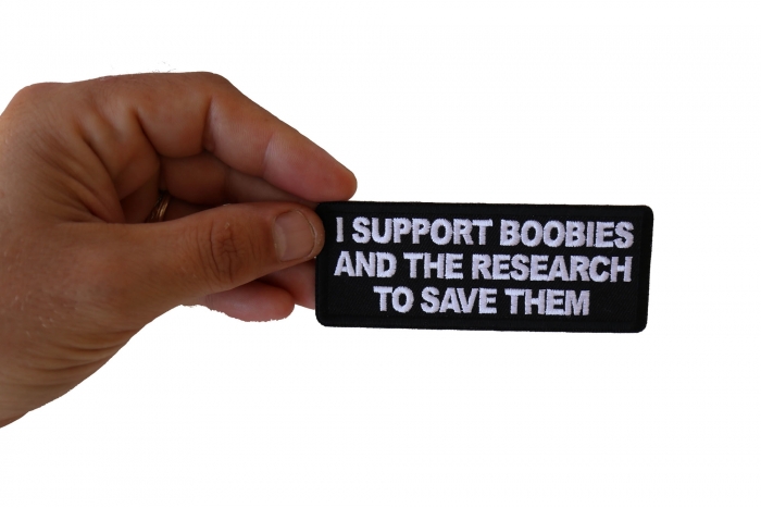 I support Boobies and The Research To Save Them Patch, Funny Saying Patches shown on hand for size comparison
