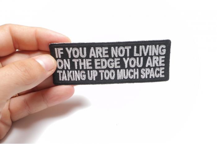 If You Are Not Living On The Edge You Are Taking Up Too Much Space Iron on Morale Patch shown on hand for size comparison