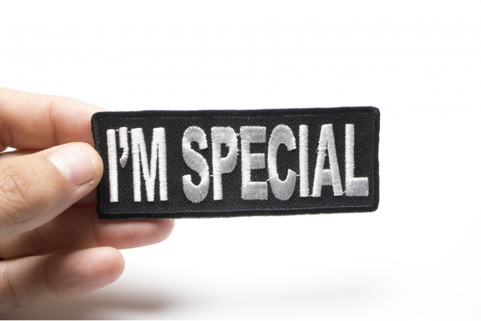 I'm Special Iron on Morale Patch shown on hand for size comparison