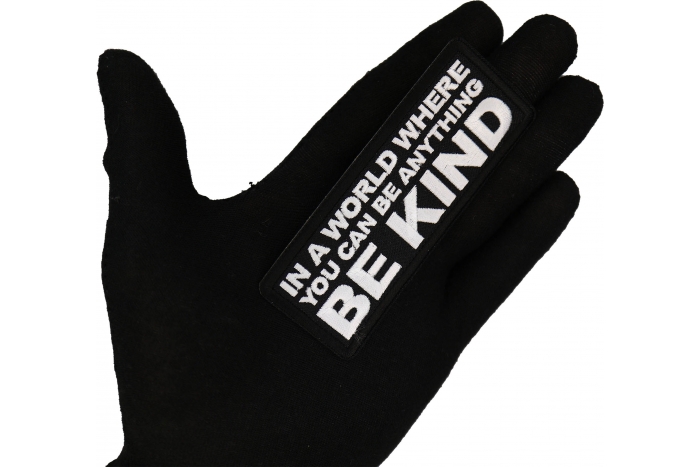 In a World Where you can be Anything Be Kind Patch shown on hand for size comparison