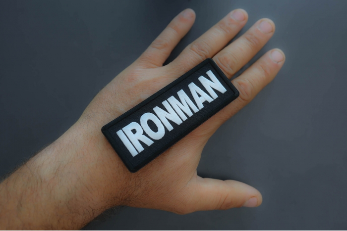 Ironman Patch shown on hand for size comparison