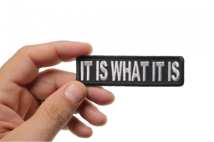It Is What It Is Patch, Biker Sayings shown on hand for size comparison