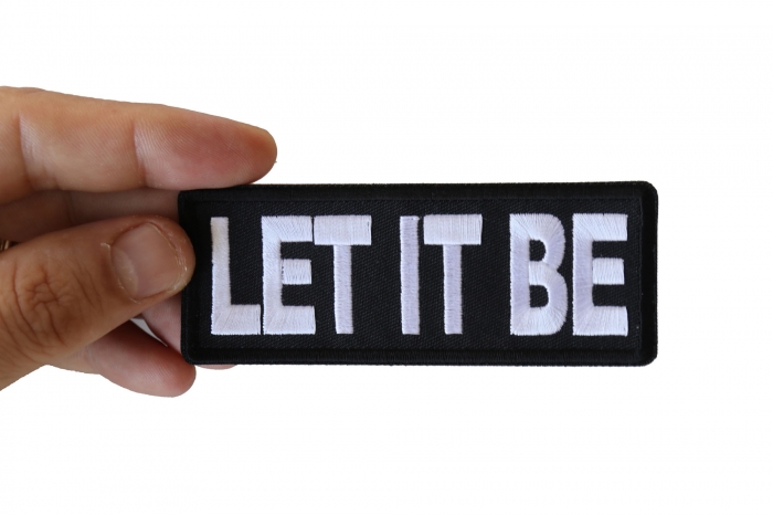 Let It Be Patch shown on hand for size comparison