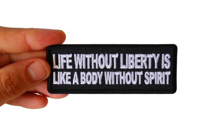 Life Without Liberty is Like a Body Without Spirit Iron on Morale Patch shown on hand for size comparison