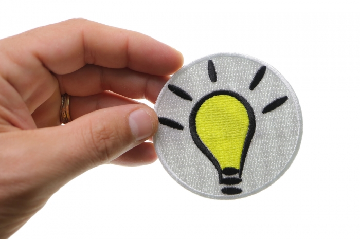  shown on hand for size comparison