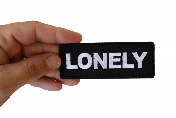 Lonely Patch shown on hand for size comparison