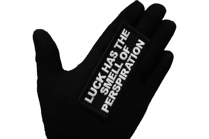 Luck has the Smell of Perspiration Patch, Funny Saying Patches, Sew or Iron on Patch shown on hand for size comparison