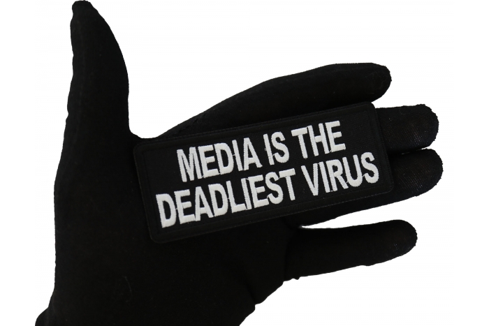 Media is the Deadliest Virus Patch shown on hand for size comparison