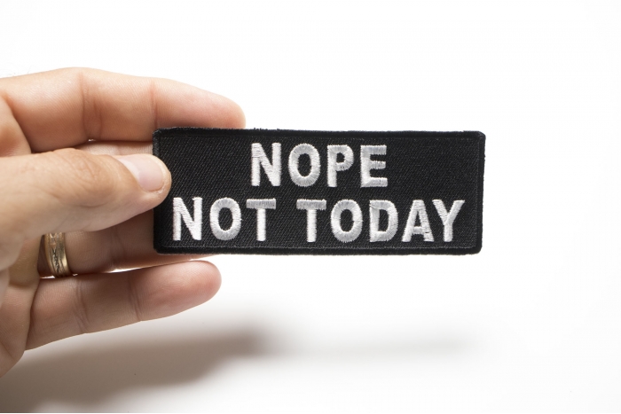 Nope Not Today Iron on Morale Patch shown on hand for size comparison