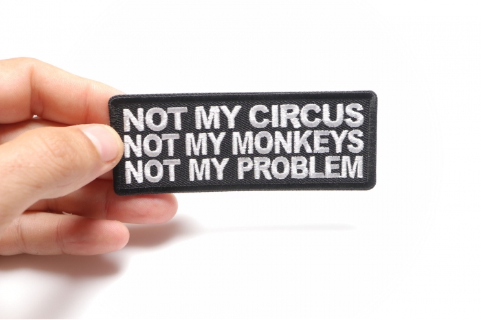 Not My Circus Not My Monkeys Not My Problem Patch, Funny Saying Patches shown on hand for size comparison