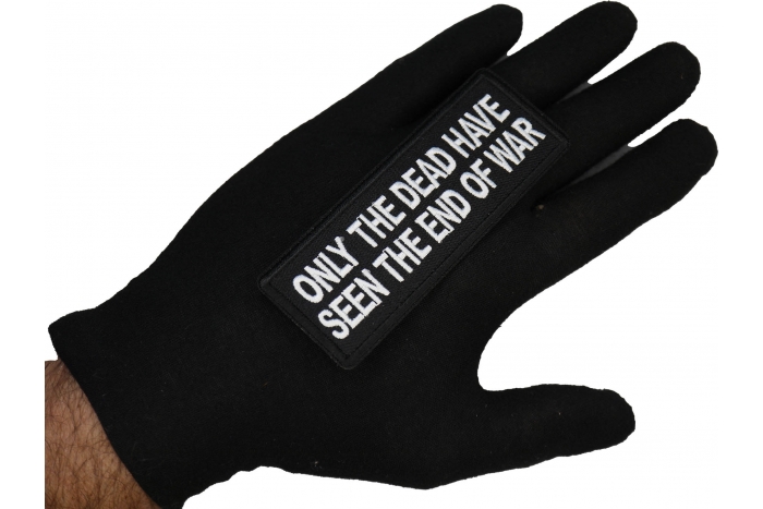 Only The Dead have seen the End of War Patch shown on hand for size comparison