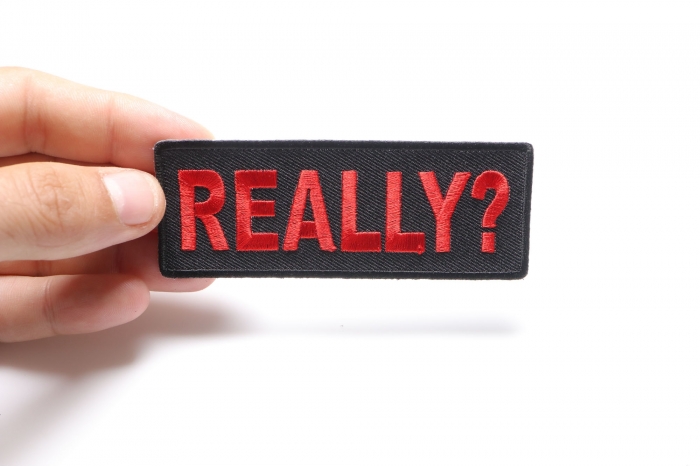 Really Iron on Patch shown on hand for size comparison