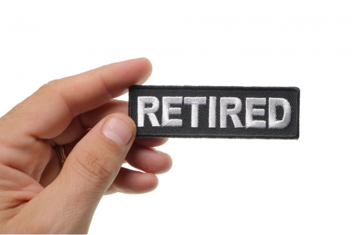 Retired Patch shown on hand for size comparison