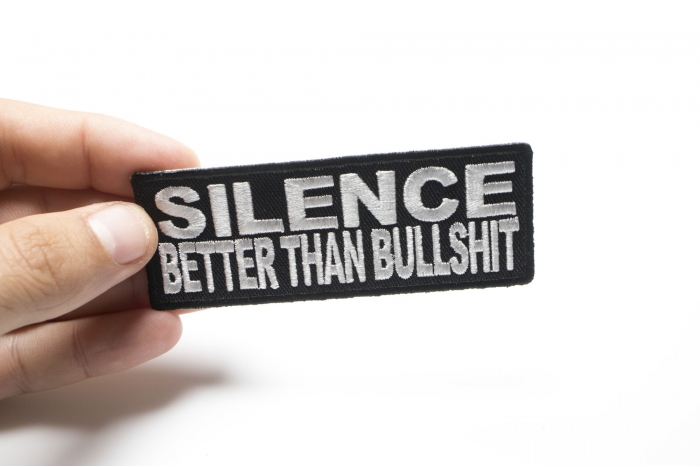 Silence Better Than Bullshit Iron on Morale Patch shown on hand for size comparison