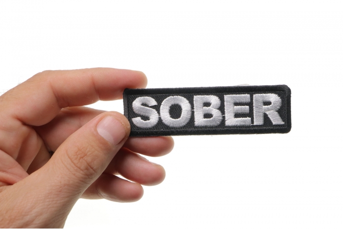 Sober Patch shown on hand for size comparison