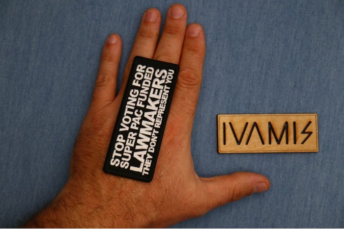 Stop Voting For Super Pac Funded Lawmakers They Don't Represent You Patch shown on hand for size comparison