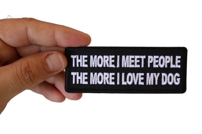 The More I meet People The More I love My Dog shown on hand for size comparison