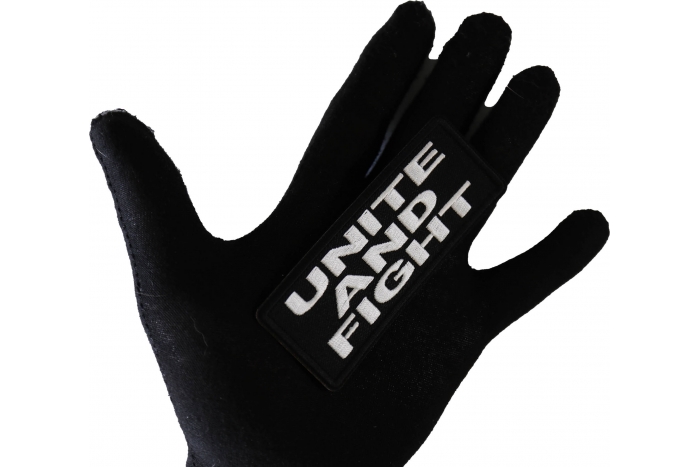 Unite and Fight Patch shown on hand for size comparison