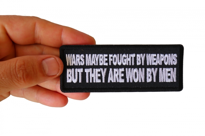 Wars Maybe fought by weapons but they are won my Men Iron on Morale Patch shown on hand for size comparison