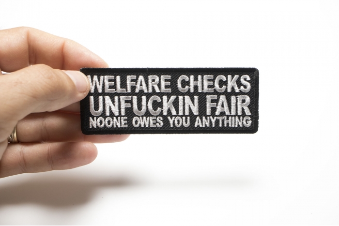 Welfare Checks Unfuckin Far Noone Owes You Anything Iron on Patch shown on hand for size comparison