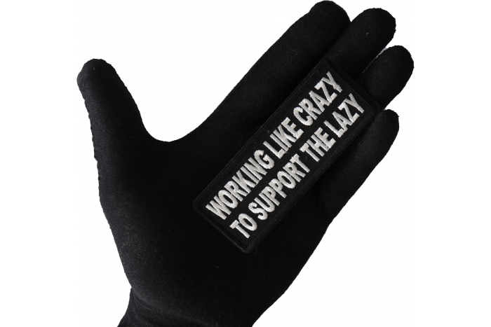 Working Like Crazy to Support The Lazy Patch shown on hand for size comparison