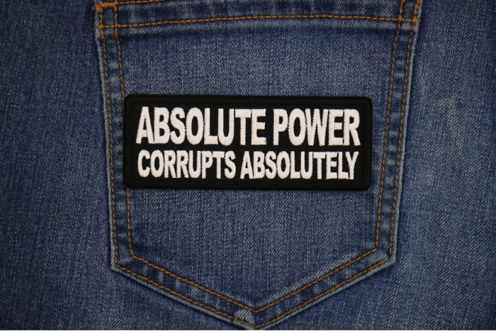 Absolute Power Corrupts Absolutely Patch shown on jeans