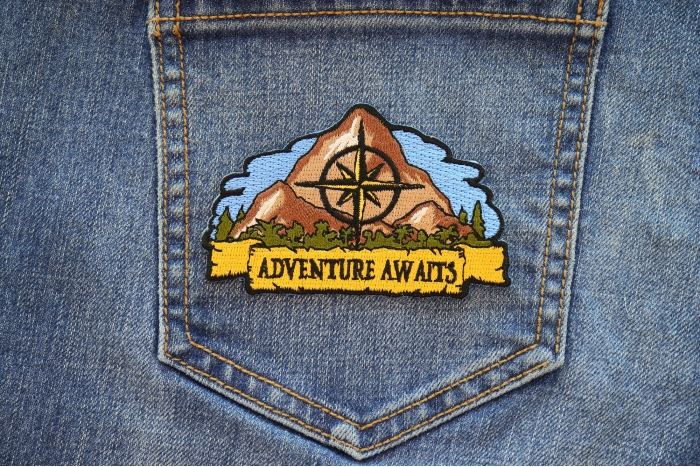 Adventure Awaits Hiker Patch shown on jeans