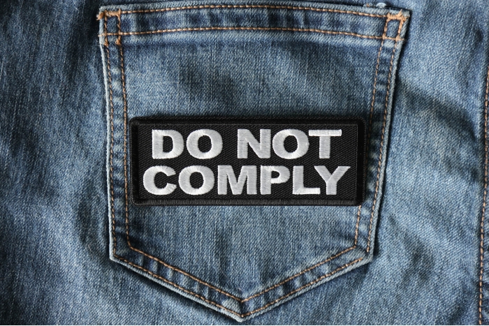 Do not Comply Patch shown on jeans
