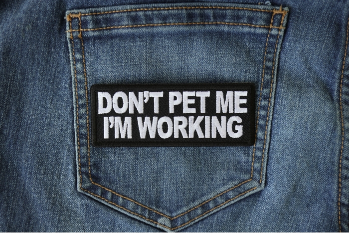 Don't Pet Me I'm Working Patch shown on jeans