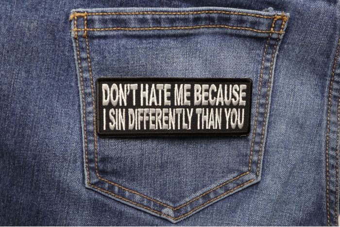 Don't Hate Me Because I Sin Differently Than You Iron on Morale Patch shown on jeans