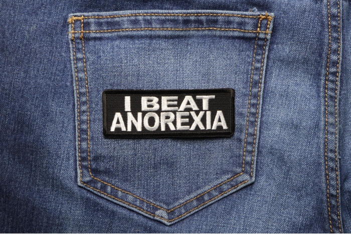 I Beat Anorexia Funny Iron on Patch shown on jeans
