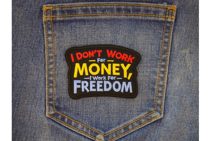 I don't work for Money I work for freedom Patch shown on jeans