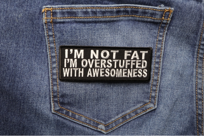 I'm Not Fat I'm Overstuffed With Awesomeness Iron on Morale Patch shown on jeans