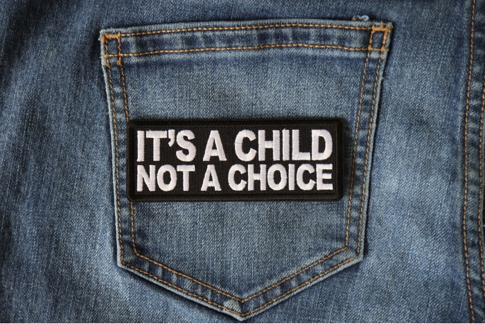 It's a Child not a Choice  Iron on Patch shown on jeans