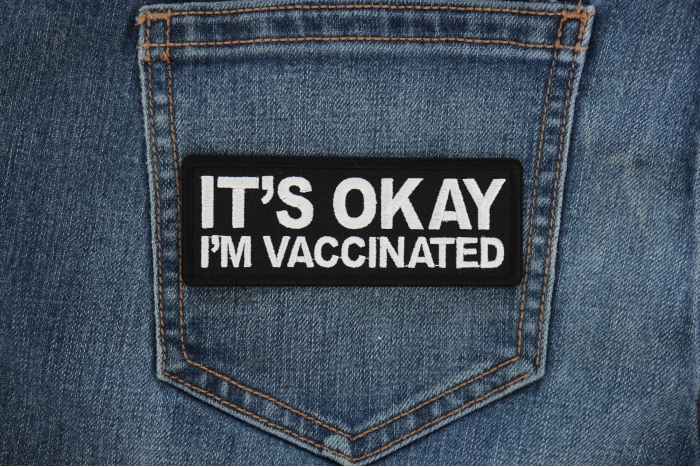 It's Okay I'm Vaccinated Patch shown on jeans