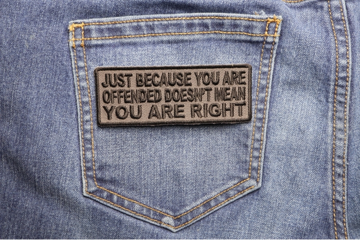 Just Because You Are Offended Doesn't Mean You're Right Iron on Morale Patch shown on jeans