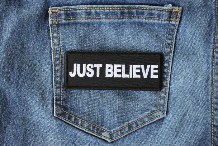 Just Believe Iron on Morale Patch shown on jeans