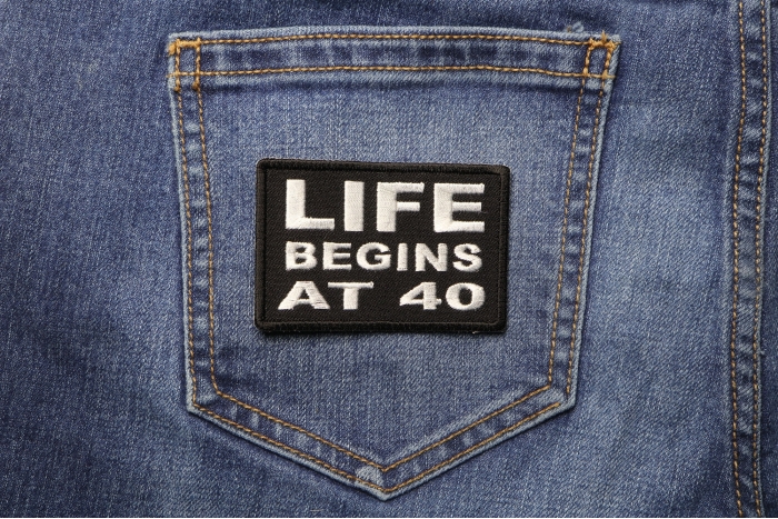 Life Begins at 40 Iron on Morale Patch shown on jeans