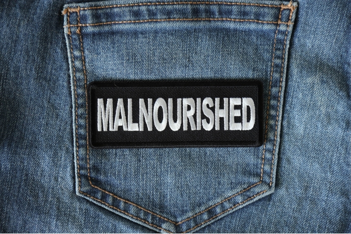 Malnourished Patch shown on jeans