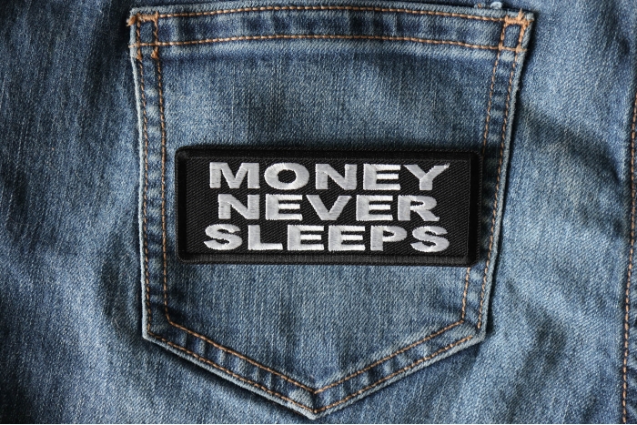 Money Never Sleeps Patch shown on jeans