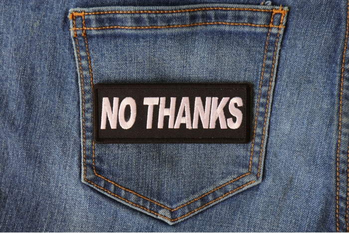 No Thanks Patch shown on jeans